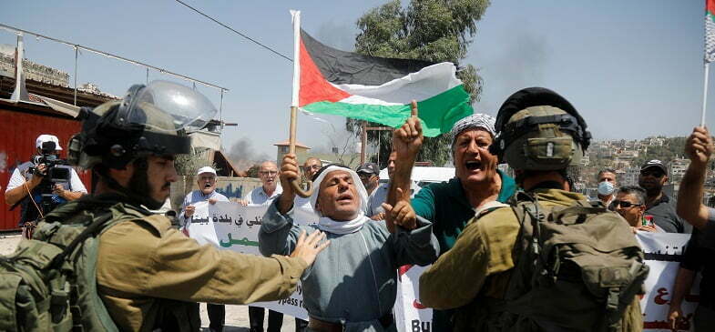 הפגנה של פלסטינים סמוך לביתא, בגדה המערבית, אוגוסט 2021 (צילום: רויטרס)