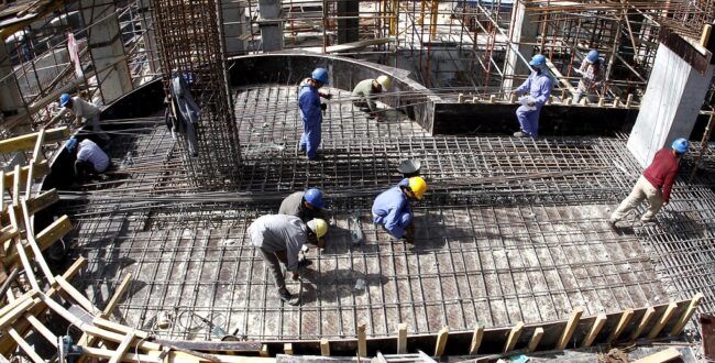 פועלי בניין. צילום: International Labour Organization ILO, מתוך פליקר